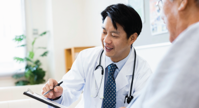 A doctor explaining a new treatment to his patient
