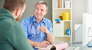 A provider talking with is patient