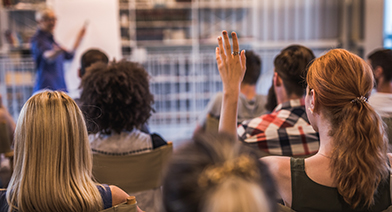 A workshop group asking questions
